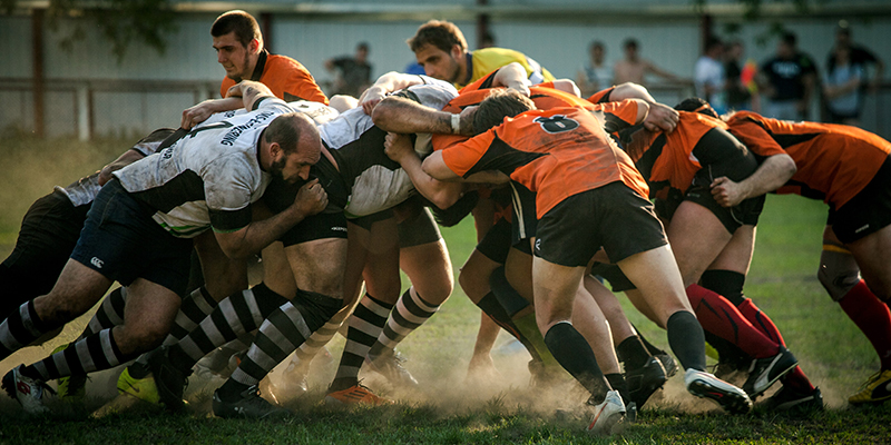 A scrum in a men's rugby match