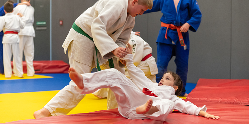 Young people doing judo