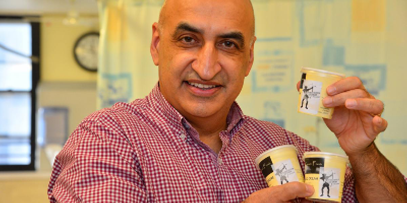 Professor Opinder Sahota showing pots of the N-ICE cream